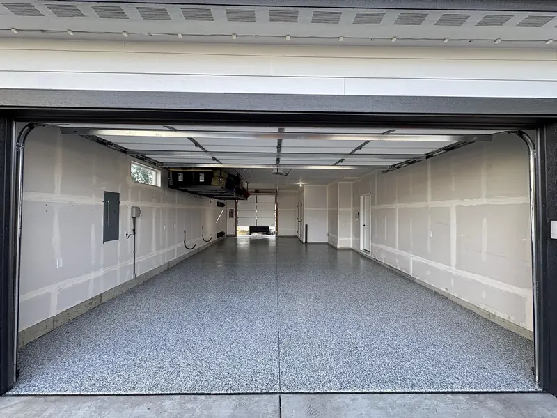 Interior room with decorative flake polyaspartic floor coating